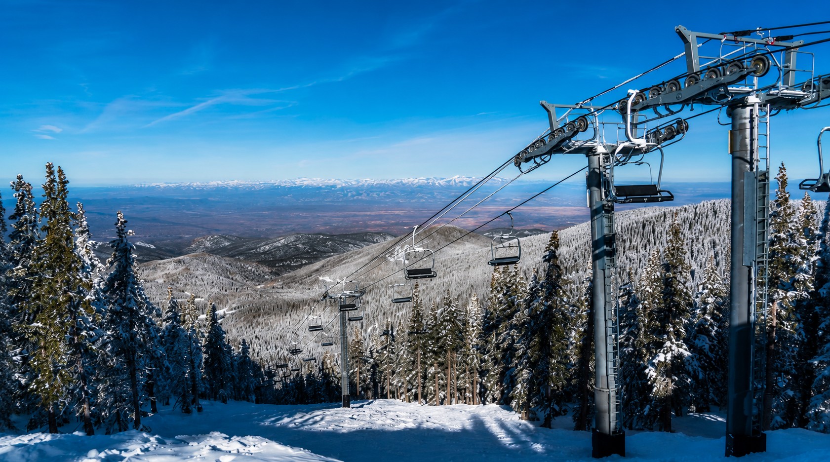 The surrounding mountains rising above Santa Fe